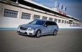 Mercedes AMG Driving Academy - Castelet - E63 AMG Estage gris 3/4 avant gauche travelling penché