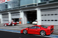 Modena Track Days 2011 - Ferrari F40 rouge 3/4 arrière gauche filé penché