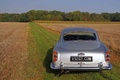 Aston Martin DB4 gris face arrière