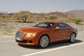 Bentley Continental GT orange 3/4 avant gauche travelling penché