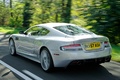 Aston Martin DBS gris 3/4 arrière gauche travelling