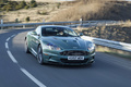 Aston Martin DBS vert 3/4 avant droit travelling penché 4