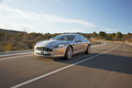 Aston Martin Rapide gris 3/4 avant gauche travelling