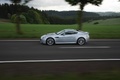 Aston Martin V12 Vantage gris profil travelling