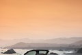 Aston Martin V8 Vantage Roadster blanc 3/4 arrière gauche debout
