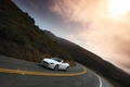 Aston Martin V8 Vantage Roadster blanc 3/4 avant gauche filé penché