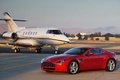 Aston Martin V8 Vantage rouge 3/4 avant gauche