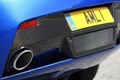 Aston Martin V8 Vantage S bleu échappement