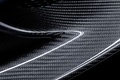 Aston Martin V8 Vantage S bleu spoiler carbone debout