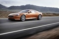 Aston Martin Virage orange 3/4 avant gauche travelling 2