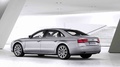 Audi A8 L gris 3/4 arrière gauche