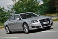 Audi A8 L gris 3/4 avant droit travelling penché 3