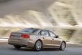 Audi A8 L W12 beige 3/4 arrière droit travelling penché