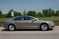 Audi A8 L W12 beige profil travelling penché