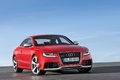 Audi RS5 rouge 3/4 avant droit penché 3