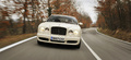 Bentley Brooklands blanc face avant travelling penché