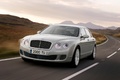 Bentley Continental Flying Spur Speed blanc 3/4 avant gauche travelling penché