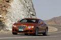 Bentley Continental GT orange 3/4 avant gauche filé penché
