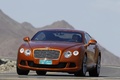 Bentley Continental GT orange 3/4 avant gauche penché