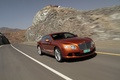Bentley Continental GT orange 3/4 avant gauche travelling penché