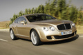 Bentley Continental GT Speed beige 3/4 avant droit travelling penché 3