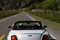 Bentley Continental Supersports Convertible blanc face arrière travelling debout