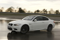 BMW M3 E92 blanc 3/4 avant gauche travelling