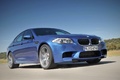 BMW M5 2011 bleu 3/4 avant droit travelling penché 5