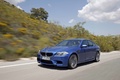 BMW M5 2011 bleu 3/4 avant gauche travelling 3
