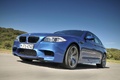 BMW M5 2011 bleu 3/4 avant gauche travelling penché 6