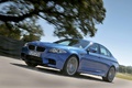 BMW M5 2011 bleu 3/4 avant gauche travelling penché 7