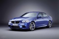 BMW M5 2011 bleu 3/4 avant gauche