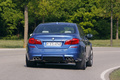 BMW M5 2011 -  bleu - arrière, dynamique