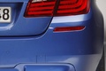 BMW M5 2011 bleu face arrière coupé debout