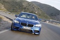BMW M5 2011 bleu face avant travelling penché 3
