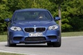 BMW M5 2011 bleu face avant