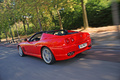 Ferrari 575 SuperAmerica rouge 3/4 arrière gauche travelling penché 3