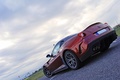 Ferrari 599 GTO bordeaux 3/4 arrière gauche penché