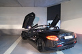 Mercedes McLaren SLR 722s Roadster noir 3/4 arrière gauche portes ouvertes