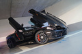 Mercedes McLaren SLR 722s Roadster noir 3/4 avant droit penché portes + capot ouverts