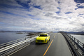 Mercedes SLS AMG E-Cell jaune 3/4 avant gauche travelling vue de haut