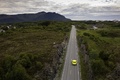 Mercedes SLS AMG E-Cell jaune face arrière vue de haut