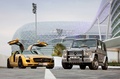 Mercedes SLS AMG Gold Edition 3/4 avant droit portes ouvertes & G55 AMG Edition gris mate 3/4 avant gauche
