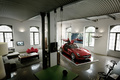 Mercedes SLS AMG rouge 3/4 avant droit portes ouvertes maison vue de haut