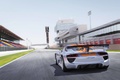 Porsche 918 RSR gris/orange 3/4 arrière gauche travelling penché