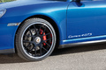 Porsche 997 Carrera 4 GTS - bleue - détail, jante + portière