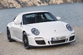 Porsche 997 Carrera GTS blanc 3/4 avant droit penché