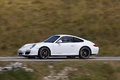 Porsche 997 Carrera GTS blanc 3/4 avant gauche filé