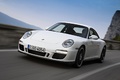 Porsche 997 Carrera GTS blanc 3/4 avant gauche travelling penché 3