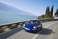 Porsche 997 Carrera GTS Cabriolet bleu 3/4 avant gauche travelling penché vue de haut 2
